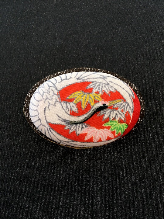 Handmade Japanese brooch in vintage silk kimono fabric with Flying lucky crane motif