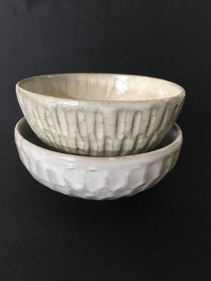 Handmade Japanese ceramic dimple bowl in cream and pale grey tones from Zenbu Home 