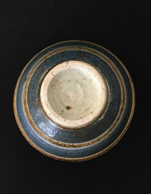 Handmade Japanese speckled ceramic bowl in cream, blue and rust is available at Zenbu Home