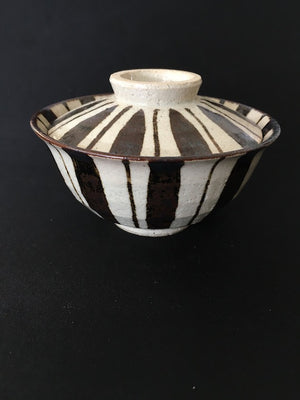 Striking handmade Japanese ceramic bowl with lid in coffee and cream glaze available at Zenbu Home