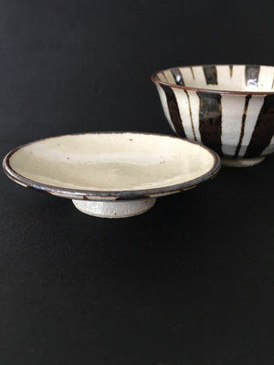 Striking handmade Japanese ceramic bowl with lid in coffee and cream glaze available at Zenbu Home