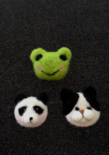 Handmade felt panda face brooch made in Kyoto Japan